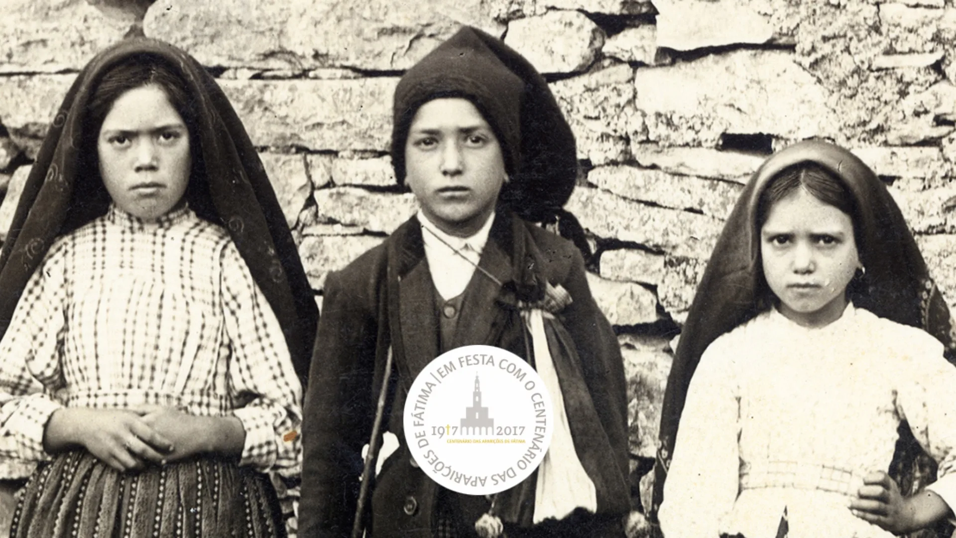 Historical photograph of the three shepherd children of Fátima, Lúcia dos Santos, Jacinta Marto, and Francisco Marto, who witnessed the Marian apparitions in 1917 in Portugal.