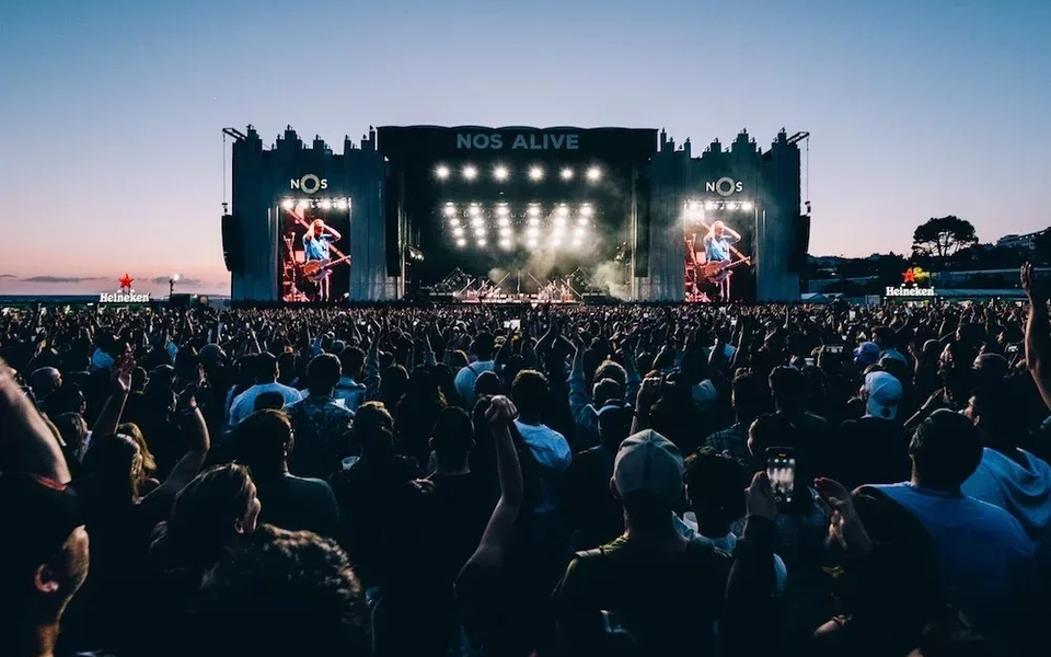 Large crowd enjoying the NOS Alive concert during sunset