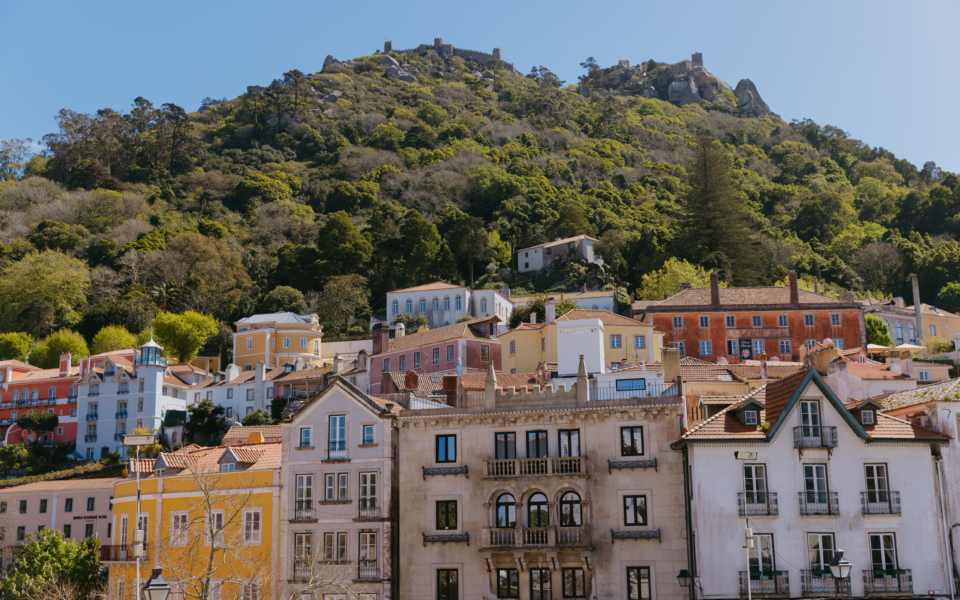 The charming town of Sintra, with the stunning Pena Palace and the Moorish castle on a picturesque hill.